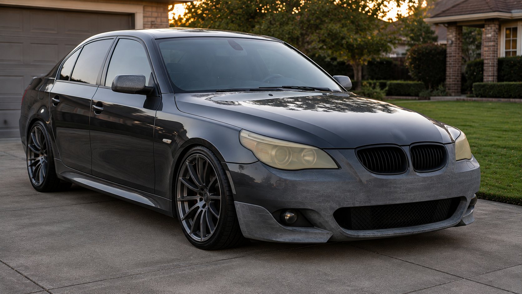 Luxury sports sedan with yellowed headlights